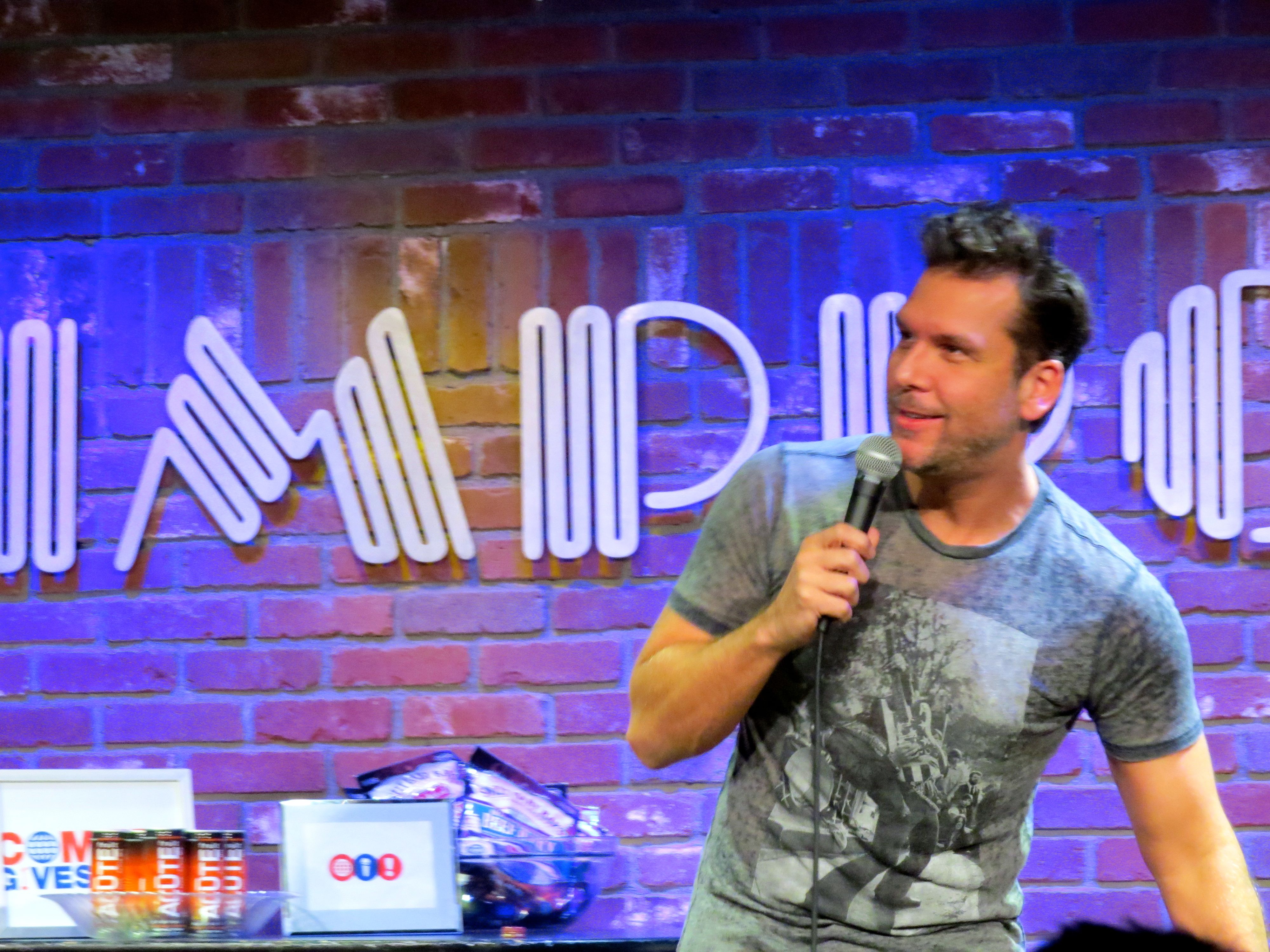 Dane Cook and 50+ Comedians receive Hero Goody necklace at Comedy Gives Back
